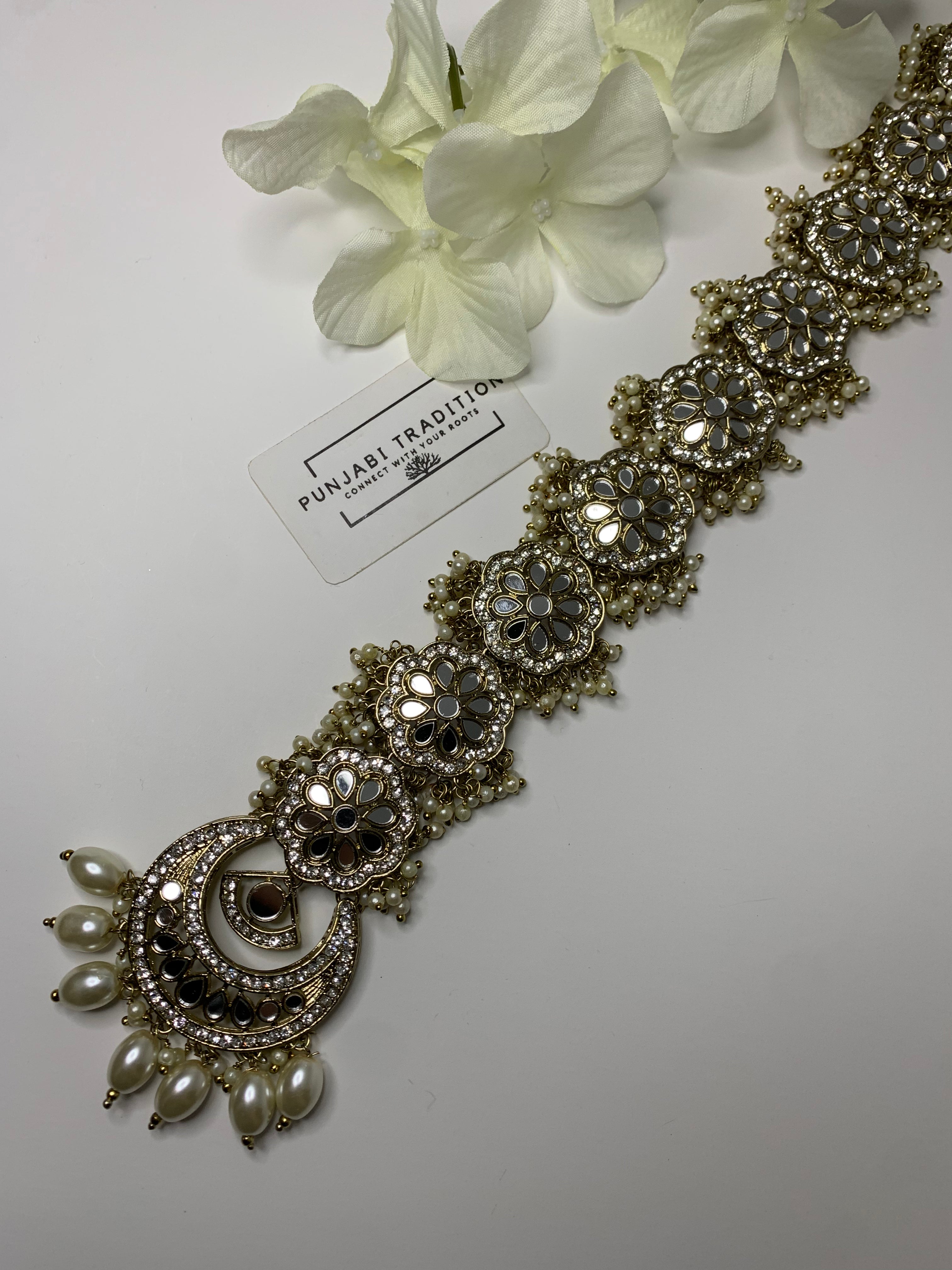 Rai  flower mirror hair accessory