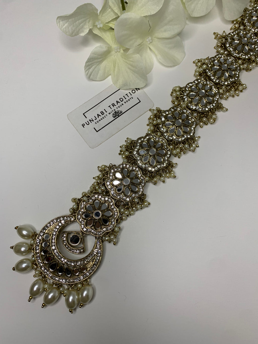 Rai  flower mirror hair accessory