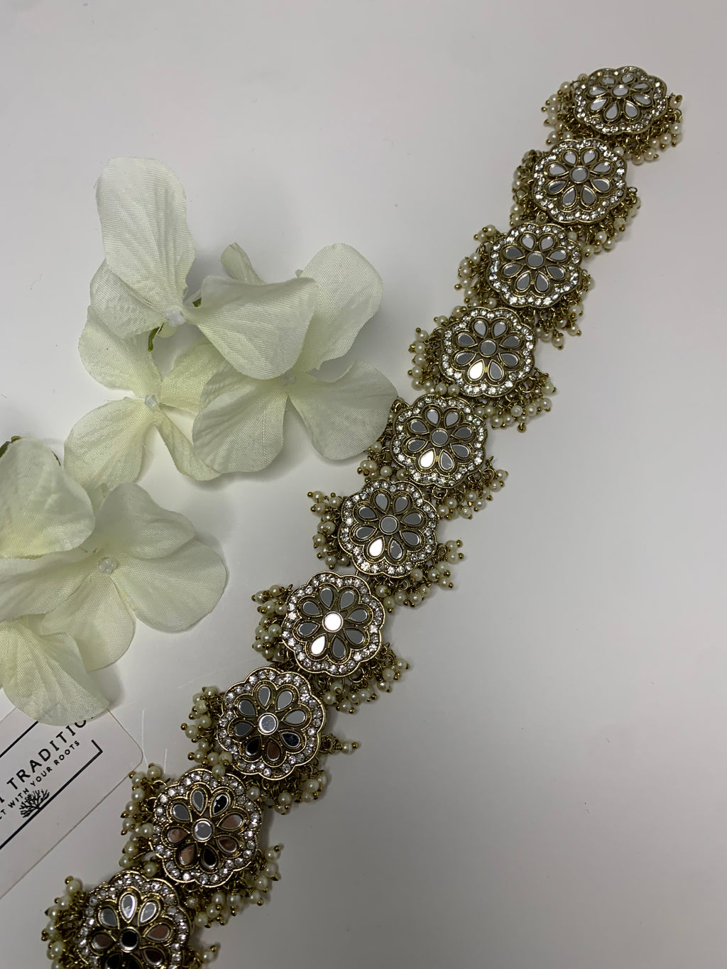 Rai  flower mirror hair accessory